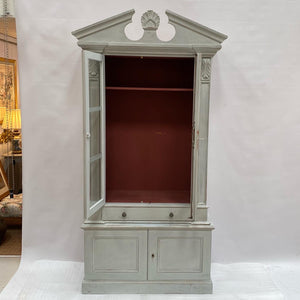A painted book case or cabinet