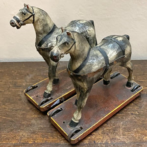 A pair of painted toy horses