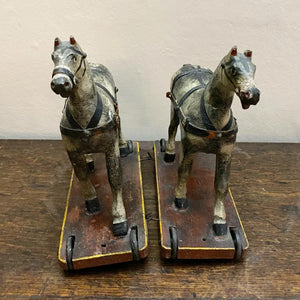 A pair of painted toy horses