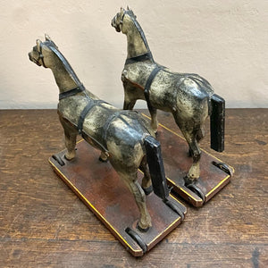 A pair of painted toy horses