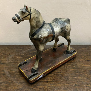 A pair of painted toy horses