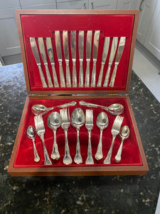 6 place setting canteen of stainless steel cutlery in Rococo style