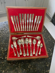 6 place setting canteen of stainless steel cutlery in Rococo style