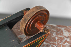 Small painted wooden wheelbarrow