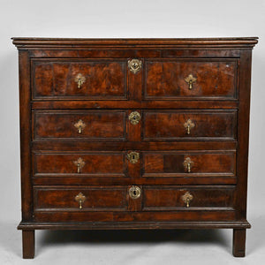 An oak and walnut chest of drawers