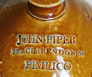 A large John Piper of Pimlico stoneware flagon