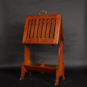 A folding Caxton in the manner of Liberty & Co.