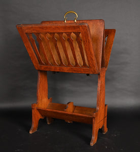 A folding Caxton in the manner of Liberty & Co.