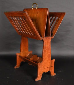 A folding Caxton in the manner of Liberty & Co.