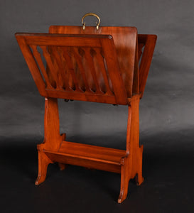 Oak folding Caxton in the manner of Liberty & Co.