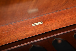 Oak folding Caxton in the manner of Liberty & Co.