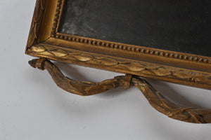 French Wall Mirror With Exceptional Foxed Plate And Cheeky Swag Detail.