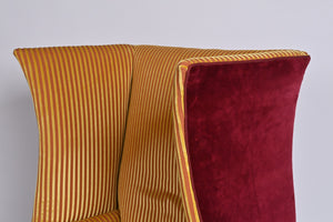 A Very Smart Wingback Armchair With Ball And Claw Feet And Brass Castors
