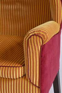 A Very Smart Wingback Armchair With Ball And Claw Feet And Brass Castors