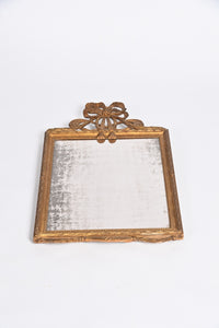 French Wall Mirror With Exceptional Foxed Plate And Cheeky Swag Detail.